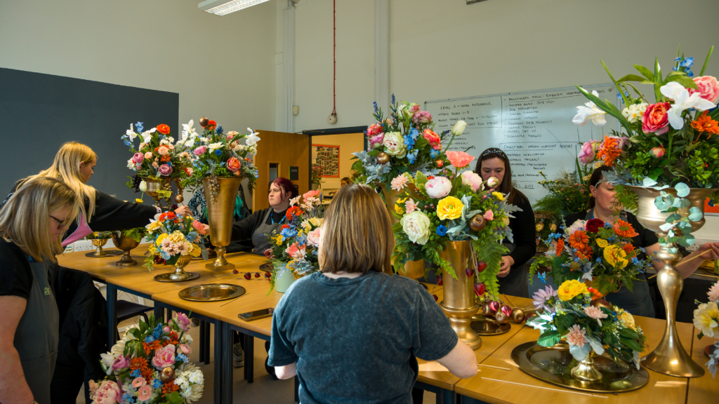 Doncaster College students creating the floral display